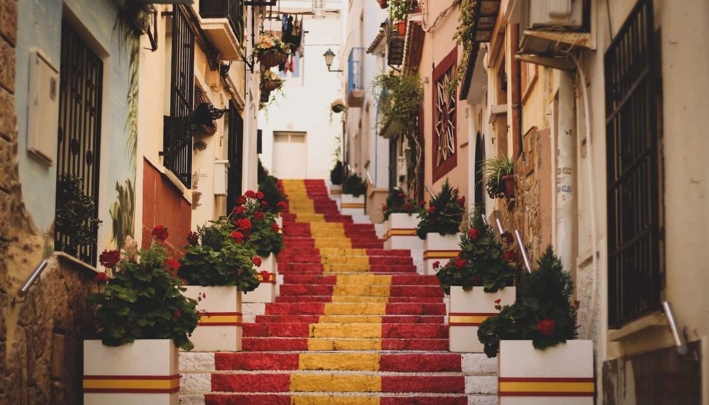 red, yellow, and white concrete stairs